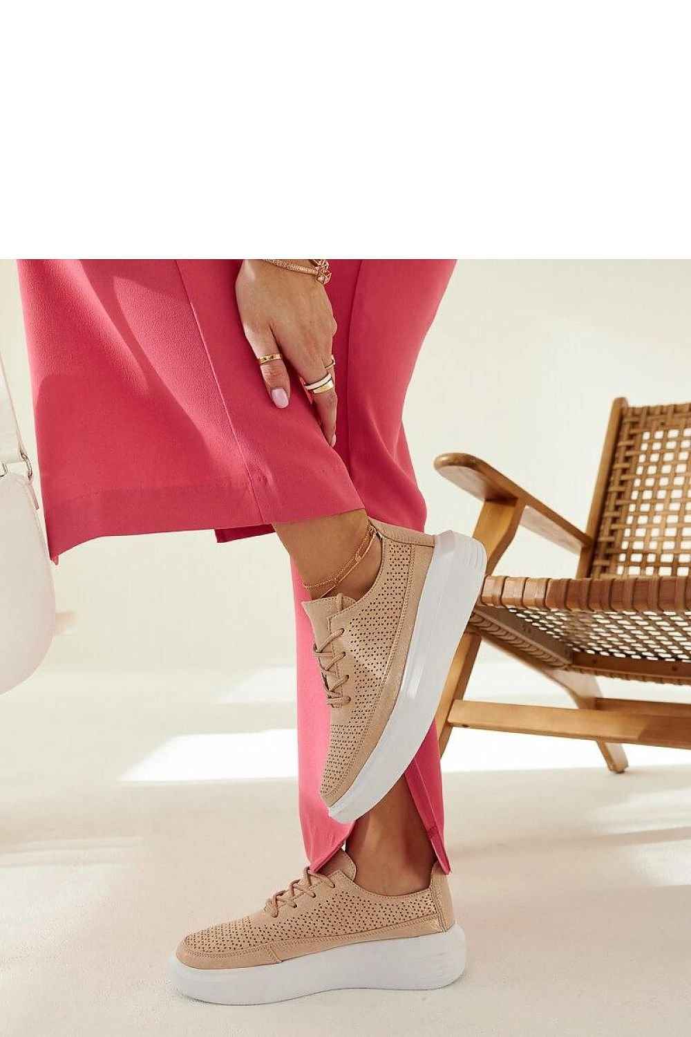 Woman’s Gold Platform Sneakers