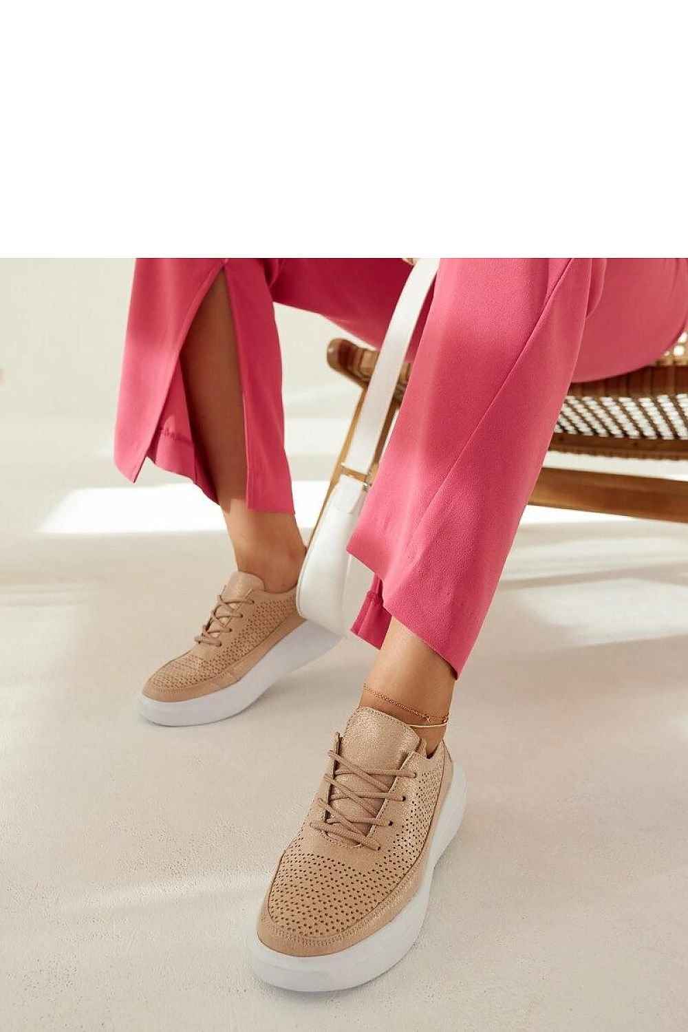Woman’s Gold Platform Sneakers