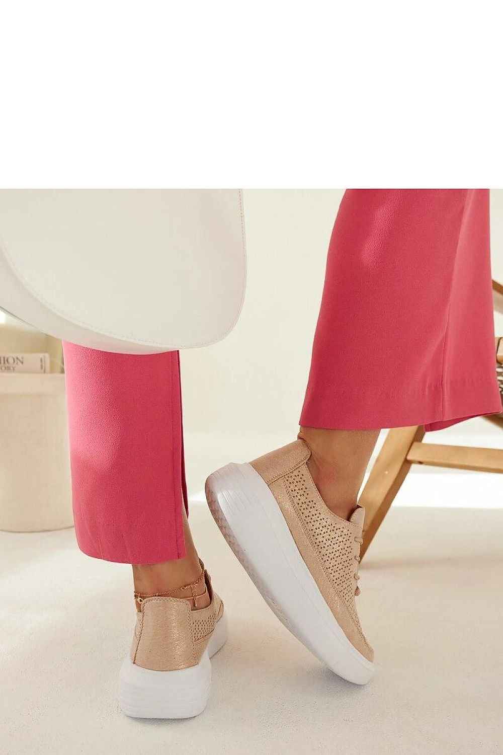 Woman’s Gold Platform Sneakers